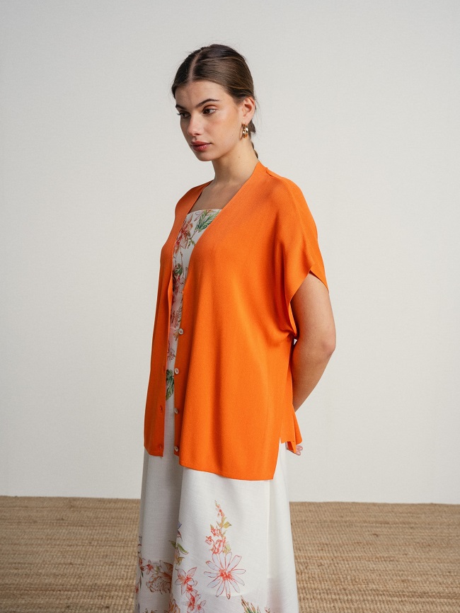 CHAQUETA ESCOTE PICO LAZOS COSTADO